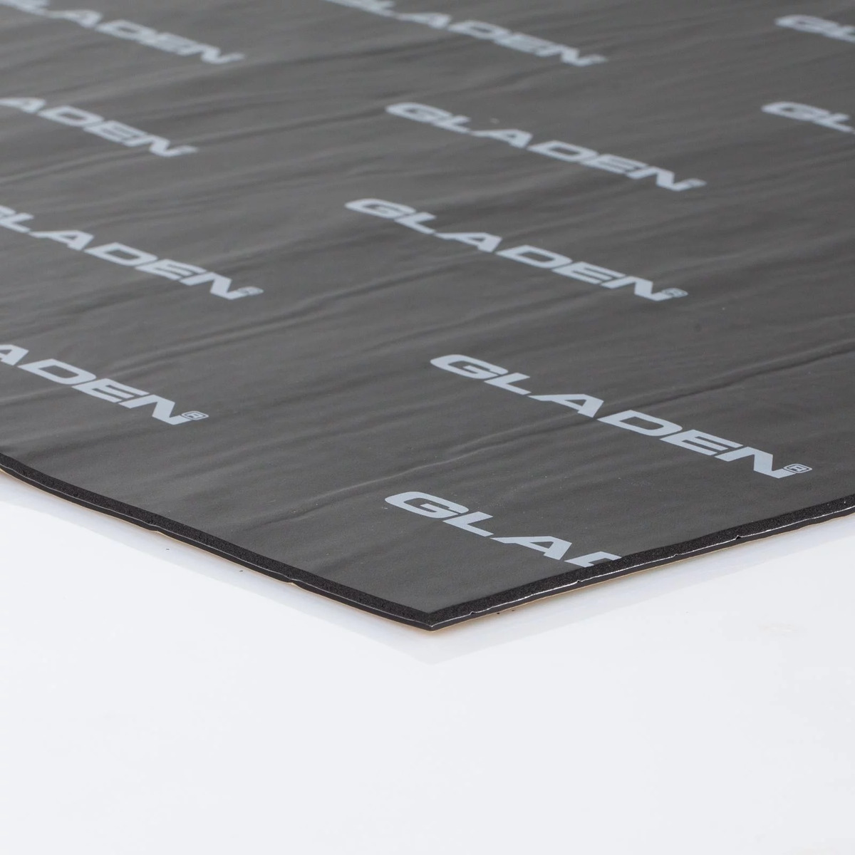 Gladen Alpha D-Multi Gladen sound-deadening mat sheet, black with repeated white gladen logos.