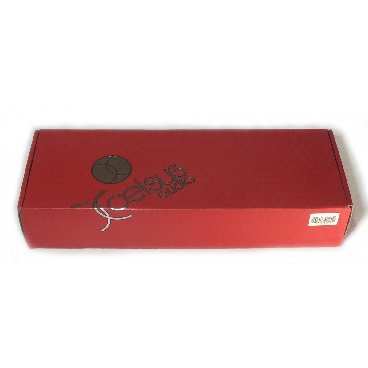 Xcelsus Audio Mag310.2Ab Celsius audio red rectangular box with black circular logo and stylized brand name.