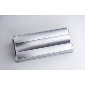 Brushed aluminum power amplifier module with integrated heatsink and gold-plated terminal connectors.