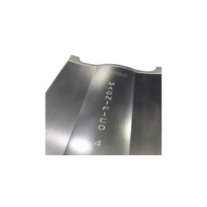Brushed stainless steel curved panel with a vertical inscription and the number 4 visible.