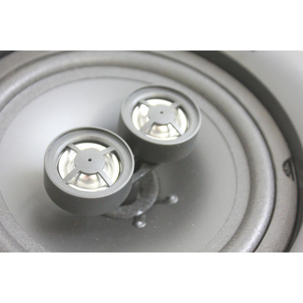 Xcelsus Audio Xic620 Pair of small black round tweeters mounted in a circular speaker enclosure.