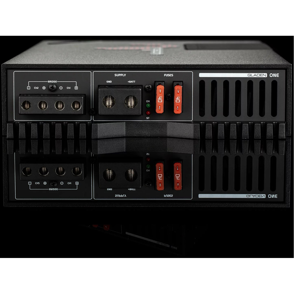 Mosconi 1-250.2 Gladen one car audio amplifier with dual fuses, gnd and +batt supply terminals, and bridgeable channels.