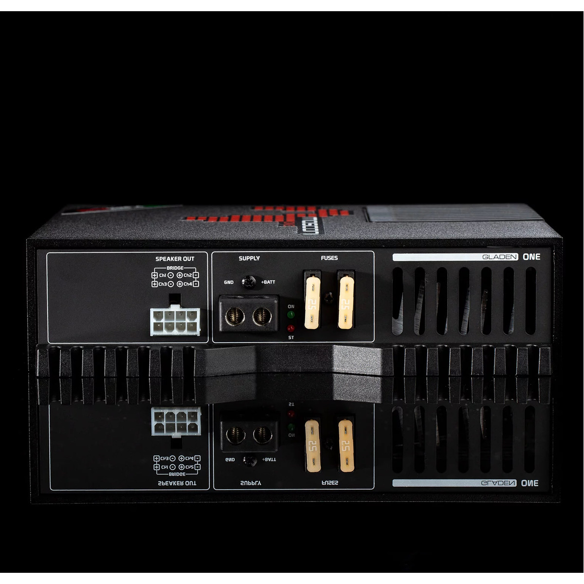 Mosconi 1-80.4 Gladen one car audio amplifier with cooling fins, dual fuses, and speaker output block.