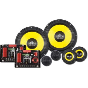 Car audio speaker kit with two large yellow-cone woofers, midrange drivers, tweeters, and crossover boards