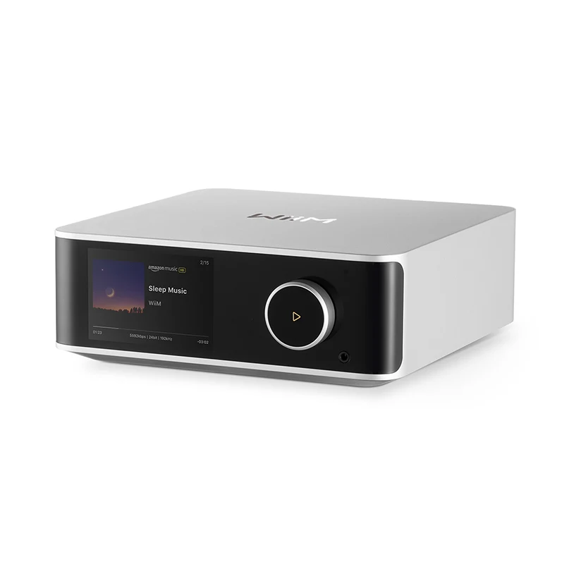 Wiim Ultra Wireless Audio Streamer And Digital Hub Naim mu-so wireless music system in white with touchscreen display and large circular volume knob.