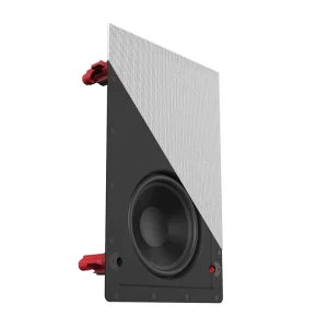 Wall-mounted speaker with a diagonal two-tone panel, visible woofer, and red binding posts.