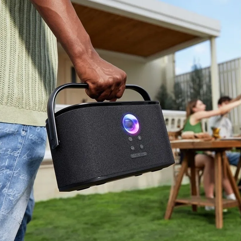 Ikarao Shell S2 Portable 140W Karaoke Speakers Portable bluetooth speaker with black fabric grille, circular led ring, and built-in handle.