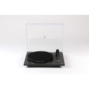 Turntable with black platter, straight tonearm, and clear dust cover on a gray plinth.