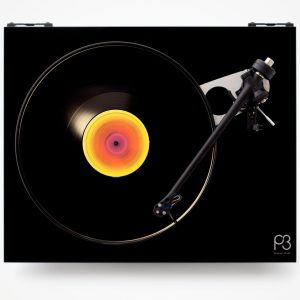Pro-Ject Planar 3 turntable with black plinth, tonearm, and colorful vinyl record.