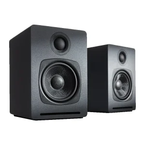 Pair of black bookshelf speakers with a large front woofer, small tweeter above, and a bottom front bass reflex slot.