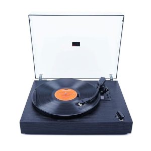 Portable black turntable with clear lid, spinning a vinyl record with orange center label and tonearm.