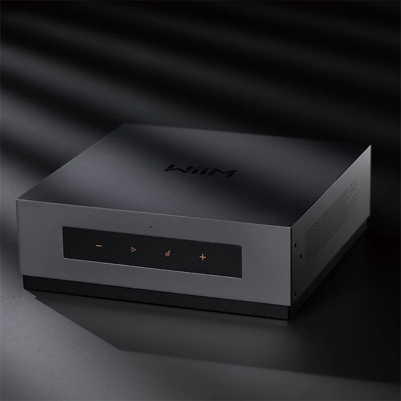 Wiim Ci Mod A80 Amplifier + Audio Streamer For Custom Installation Naim streaming amplifier with a gray metal chassis, black front panel, orange control icons, and side ventilation.