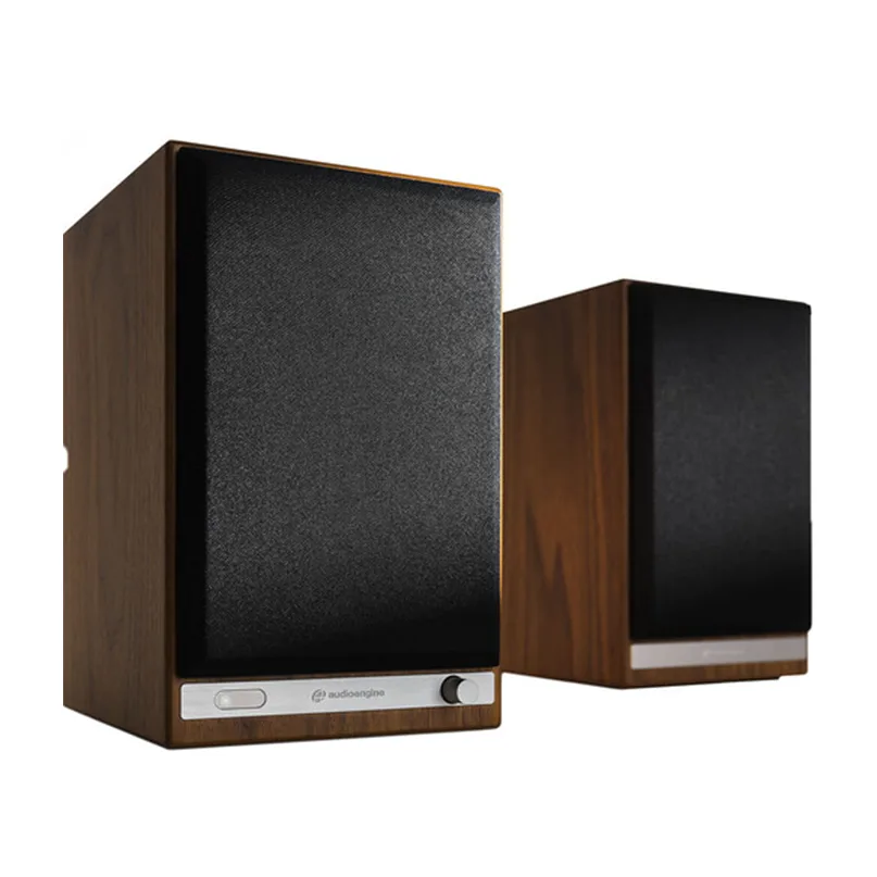 Audioengine Hd5 Wireless Bookshelf Speaker System Audioengine powered bookshelf speakers in walnut veneer with black fabric grilles and silver control panels.