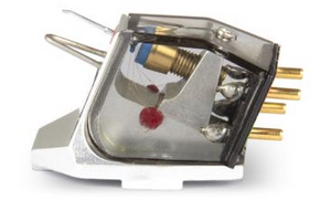 Phono cartridge with stylus for turntable; clear housing, white base, gold-plated pins.