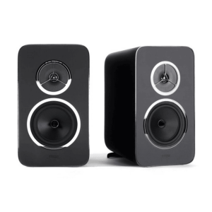 Pair of black bookshelf speakers with silver rings around the drivers and curved fronts.