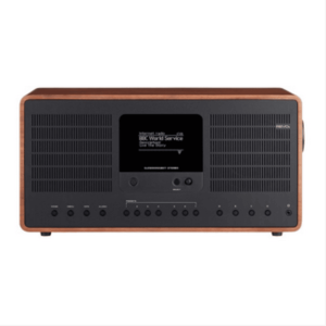 Vintage-style wooden cabinet tabletop radio with central display, side speaker grilles, and row of control buttons.