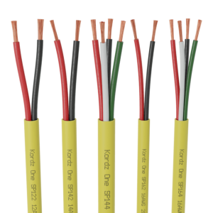 Kordz One SP speaker cables with yellow jackets and exposed red, black, white, and green conductors
