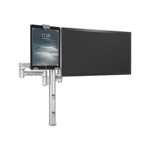 Apple iPad mounted on a silver adjustable monitor arm beside a large flat-screen monitor.