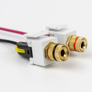 Dual white panel-mount banana binding post connectors with gold-plated knurled collars and red and black rings