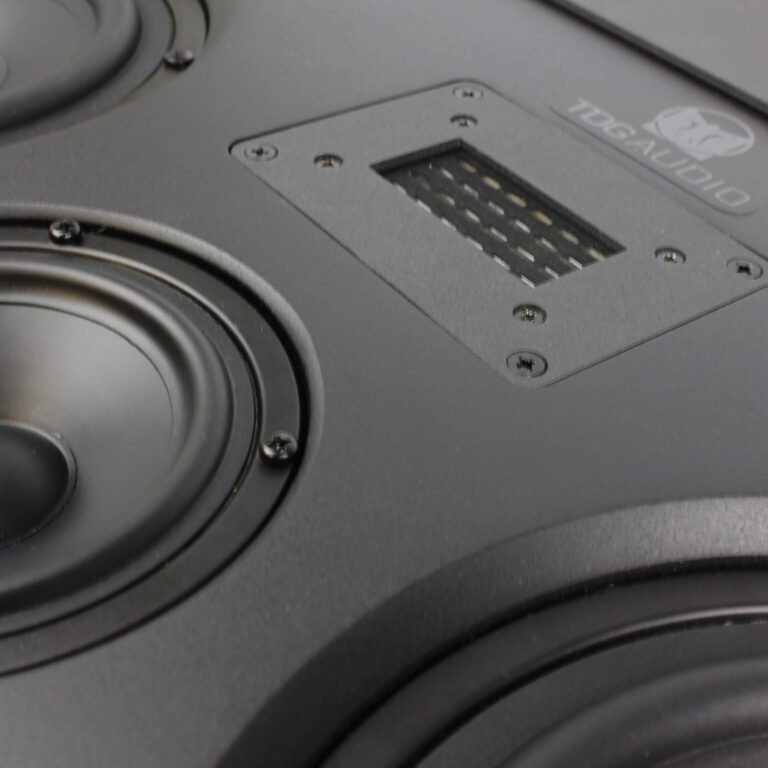 Tdg Audio Iwlcr-66V2 Dual 6.5” 3-Way In-Wall Lcr Speaker Close-up of a black loudspeaker cabinet with two large circular drivers and a rectangular vented panel.