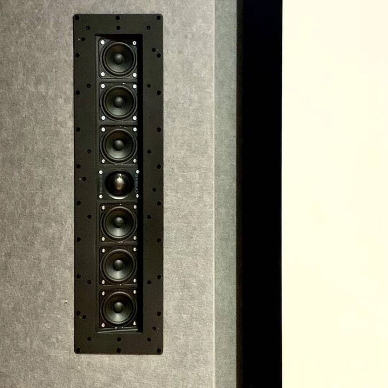 Tdg Audio Skybar™ Lcr Architectural Soundbar Black wall-mounted speaker with a vertical array of multiple round drivers.