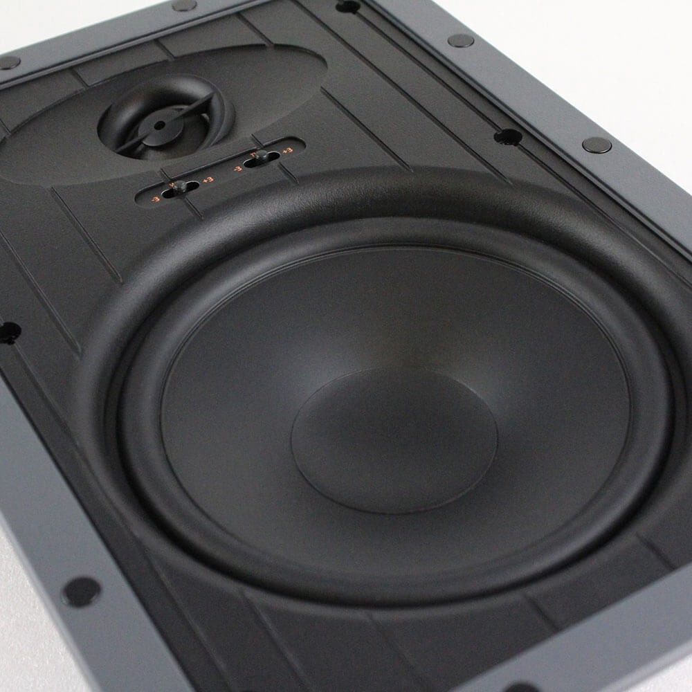 Tgd Audio Nfw-61 6.5” In-Wall Speaker Large black subwoofer in a dark gray rectangular enclosure with a thick rubber surround and central dust cap.