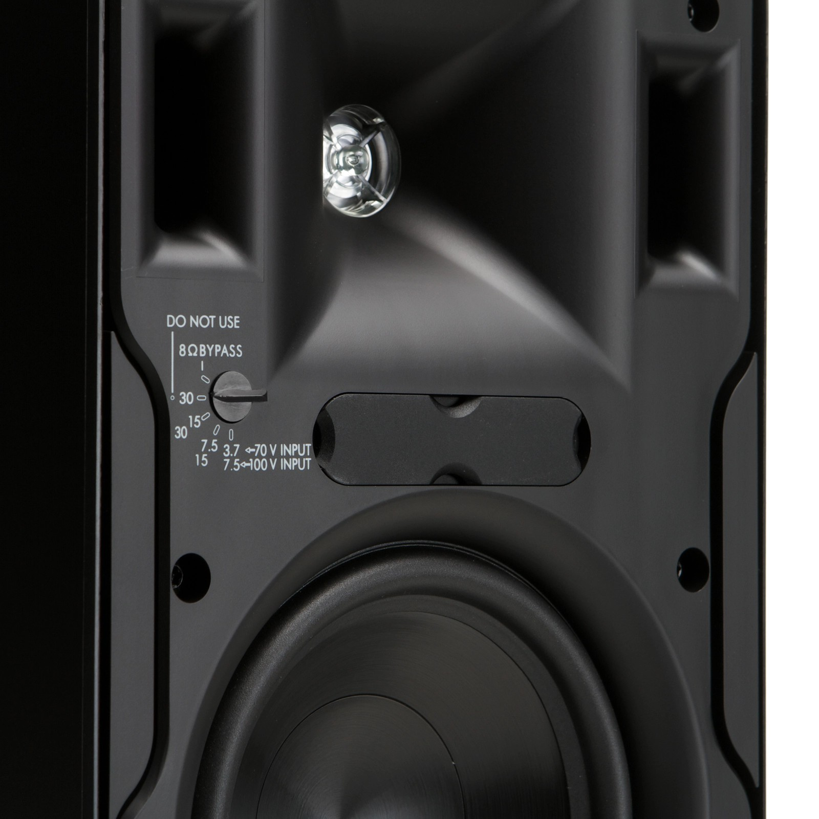 Klipsch Cp-6T Rear view of a black loudspeaker cabinet with two large woofer drivers and a do not use 8ω bypass label