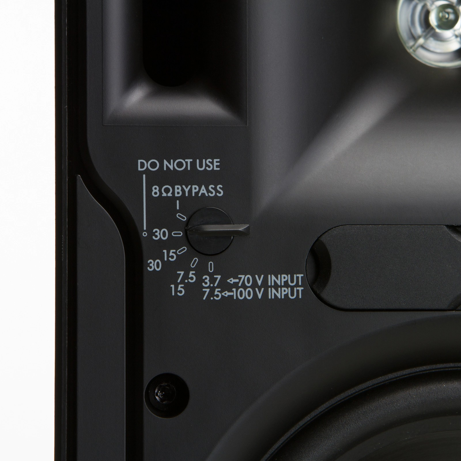 Klipsch Cp-6T Close-up of an audio amplifier panel showing 8ω bypass, a rotary dial, and 70 v / 100 v input labels.