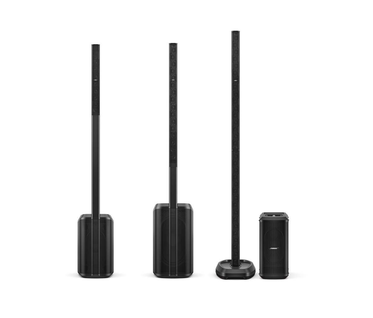 Bose Sub1 Powered Bass Module Bose home theater speaker system with three tall vertical towers on stands and a compact subwoofer.