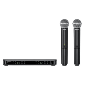 Shure wireless microphone system with two handheld transmitters and a dual-channel receiver.