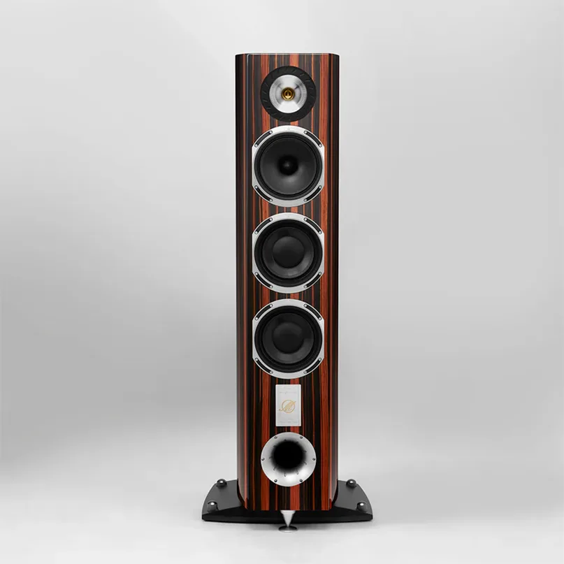 Triangle Magellan Cello 40Th Hi-Fi Floorstanding Speaker Floor-standing loudspeaker with striped wood veneer, four large drivers, and a small top tweeter.