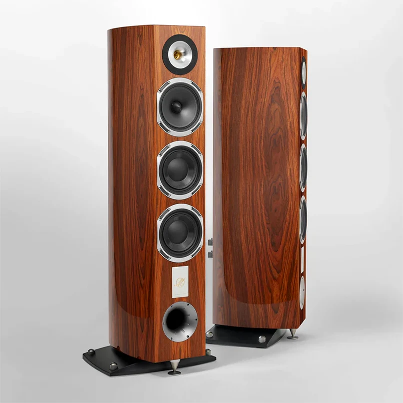 Triangle Magellan Cello 40Th Hi-Fi Floorstanding Speaker Pair of tall wood-veneer floor-standing loudspeakers with one tweeter and three woofers, silver frames, and bass reflex port.