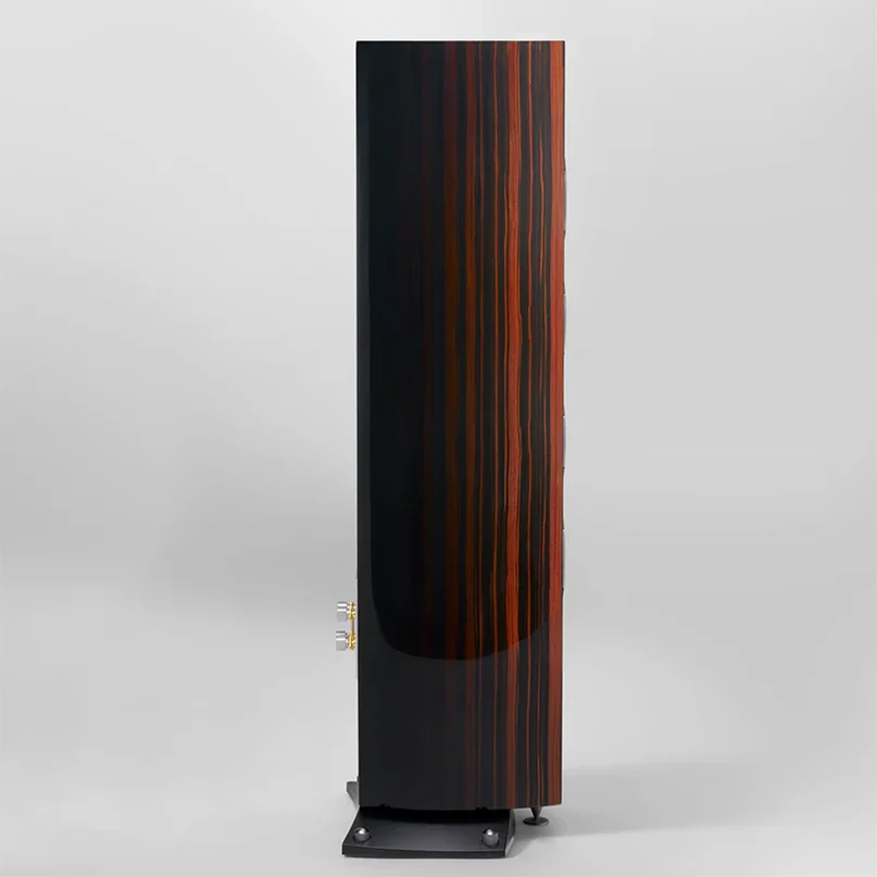 Triangle Magellan Quatuor 40Th Hi-Fi Floorstanding Speaker Tall floor-standing loudspeaker with dark wood veneer and vertical red-brown stripes, side binding posts, and a metal base.