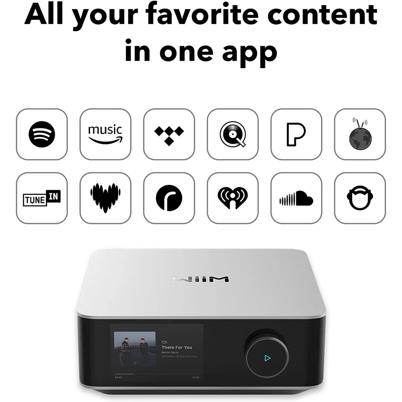 Wiim Amp Ultra Wireless Audio Streaming Amplifier Compact media streaming box with touchscreen display and large circular dial on the front, silver top, black body.