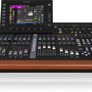 Behringer WING digital audio mixing console with large touchscreen, multiple faders and knobs, and a wooden front bar
