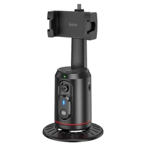 HOCO. Smart Holder “K23 Lotus” Face Tracking in black, featuring a motorized rotating base, control buttons, and an adjustable clamp for mounting smartphones.