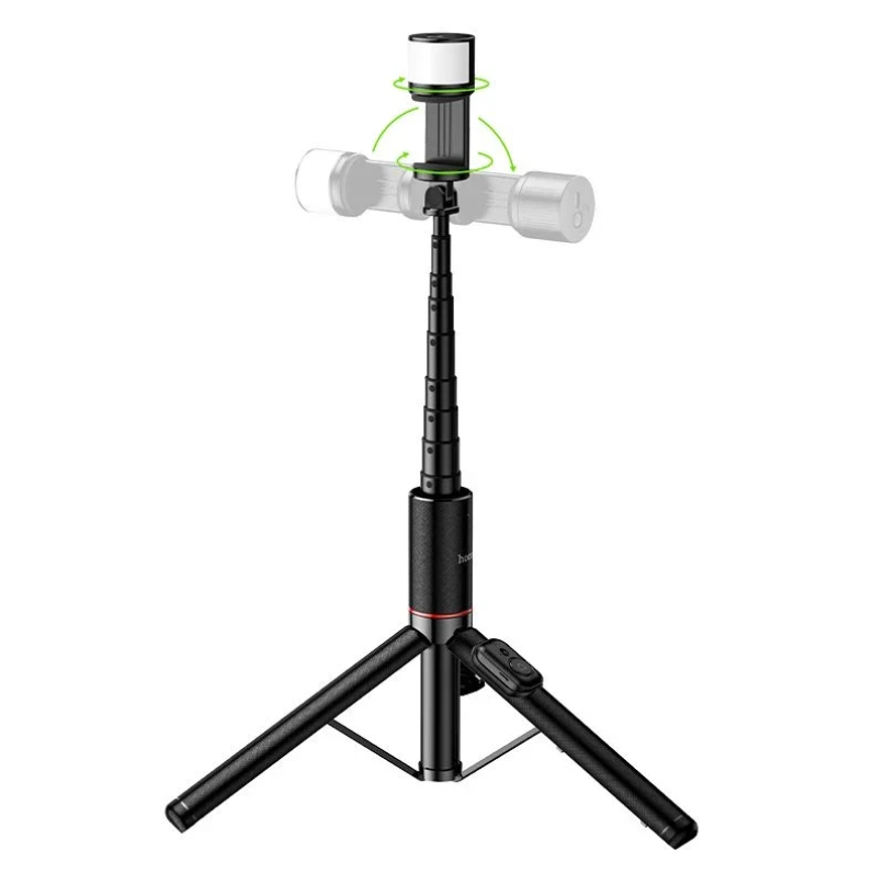 Hoco. K34 All-In-One Live Broadcast Holder Hoco. K34 all-in-one live broadcast holder featuring a black adjustable tripod with a telescoping center column, a mount at the top with rotating capability (as indicated by arrows), and a detachable remote conveniently located on one leg.