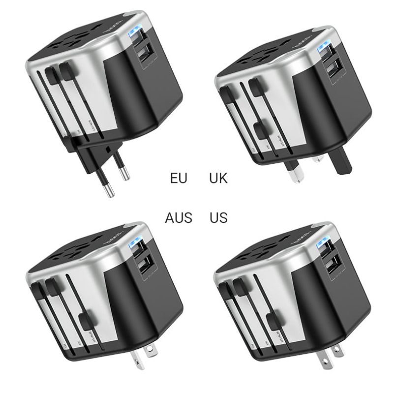 Hoco. Ac5 Dual Usb Universal Charger Adapter Four hoco. Ac5 dual usb universal charger adapters are shown with eu, uk, aus, and us plug types extended, each featuring usb ports and a sleek black-silver design.