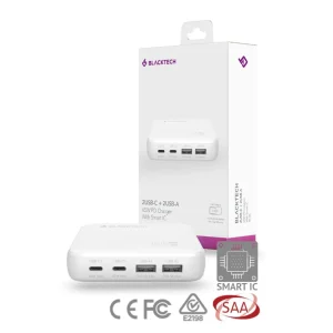 The BLACKTECH BC06 Dual USB-C Dual USB-A 65W PD Adapter Smart IC in white is displayed next to its retail packaging, with certification icons shown at the bottom.