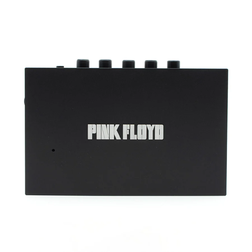 We Are Rewind Limited Edition Pink Floyd Portable Cassette Player &Amp; Recorder Black pink floyd branded guitar effects pedal with five knobs on top and a white logo on the front.