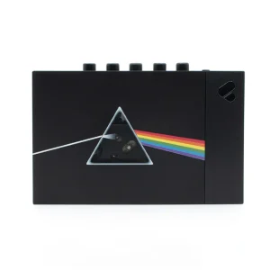 WE ARE REWIND Limited Edition Pink Floyd Portable Cassette Player & Recorder Black rectangular electronic device with five top knobs and a triangular prism rainbow graphic on the front.