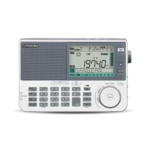 Homepage Sangean ats-909x2 fm/sw/mw/lw/air multi-band radio portable digital radio with large display, full keypad, left speaker grille, and right tuning dial.